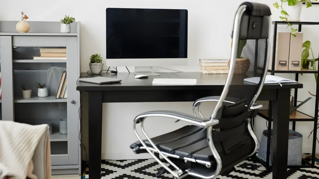 Office Chairs for Women - A feminine home office featuring an ergonomic chair adjusted for a woman's body with a soft, neutral palette.