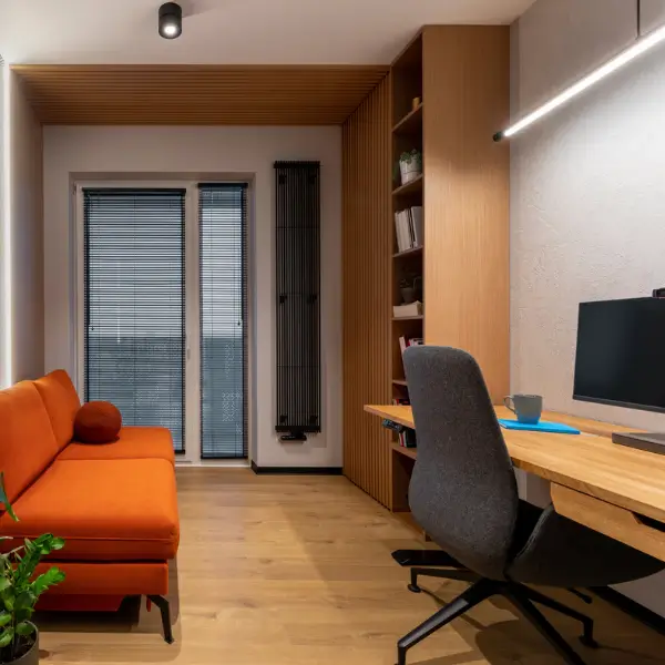 Feminine home office with a cozy desk setup and soft decor for women working from home
